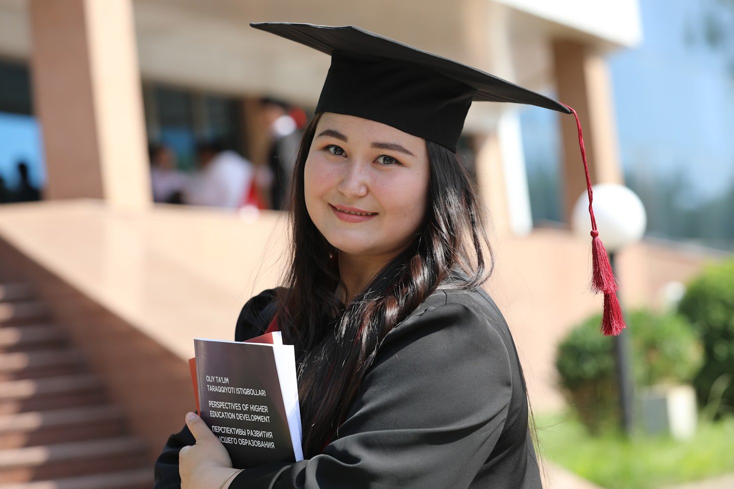 Graduate representing international academic achievement